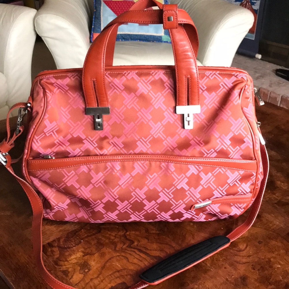 Tumi canvas and leather travel duffel bag